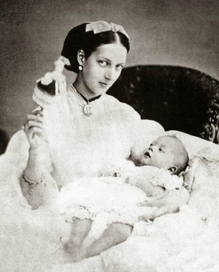 Alexandra_with_her_first_born_child_Albert_Victor
